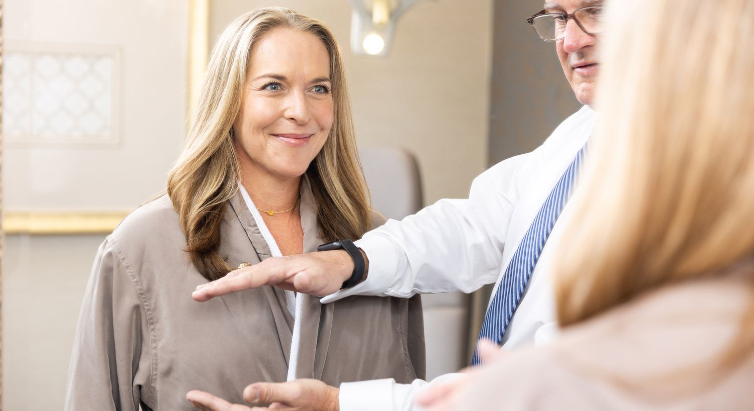 Consultation between a woman and a professional.