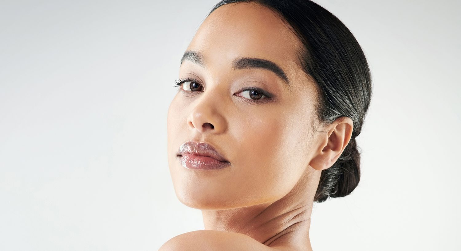 Close-up portrait of a woman with elegant look.