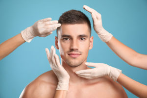 man considering plastic surgery
