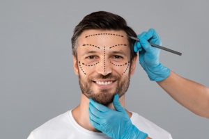 man undergoing a consulation for a cosmetic surgery procedure