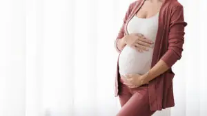 Woman pregnant after a tummy tuck procedure